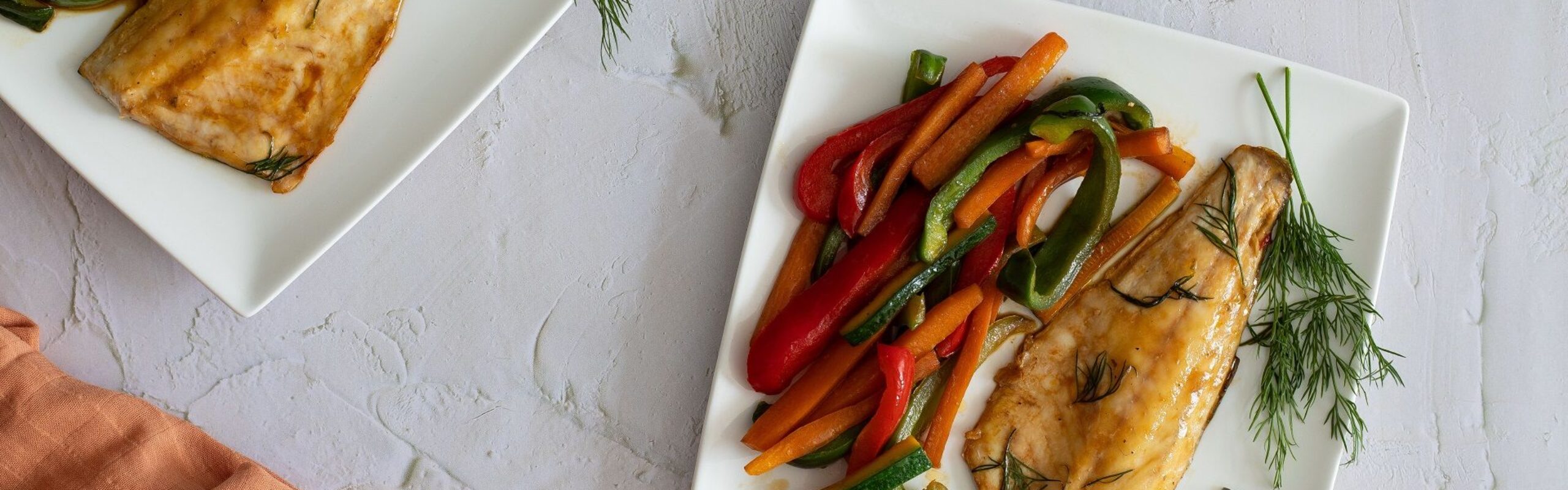 Sea bass fillets with vegetables in soy sauce